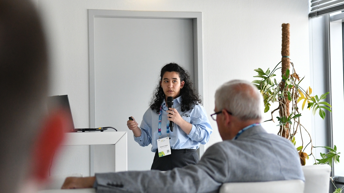 Deianira Fejzaj giving a talk at the Silicon Saxony Days 2026